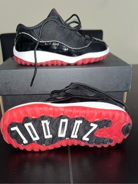 Nike Kids Black Sneakers with Red Accents